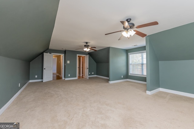 303 Sage Meadows Ln, Bonaire, GA 31005 - additional living space featuring a ceiling fan, vaulted ceiling, and carpet