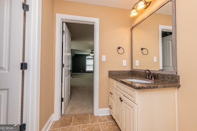 303 Sage Meadows Ln, Bonaire, GA 31005 - bathroom with vanity, ceiling fan, and tile patterned floors