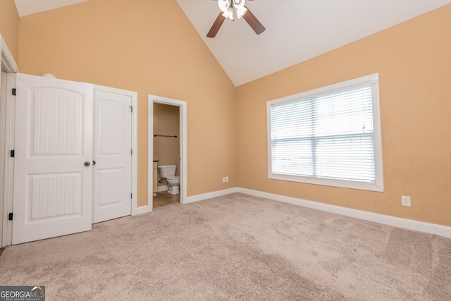 303 Sage Meadows Ln, Bonaire, GA 31005 - unfurnished bedroom featuring carpet flooring, high vaulted ceiling, ensuite bathroom, and a ceiling fan
