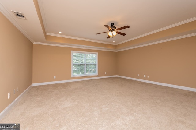 303 Sage Meadows Ln, Bonaire, GA 31005 - unfurnished room featuring ceiling fan, light carpet, a raised ceiling, and ornamental molding