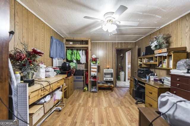 4782 Two Oak Dr, Macon, GA 31210 - office space with wood walls, light wood finished floors, ceiling fan, and heating unit