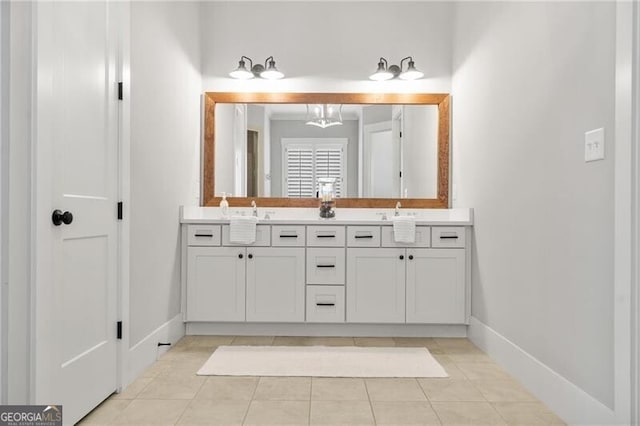 200 Ivy Meadow Way, Ball Ground, GA 30107 - bathroom featuring double vanity and tile patterned floors