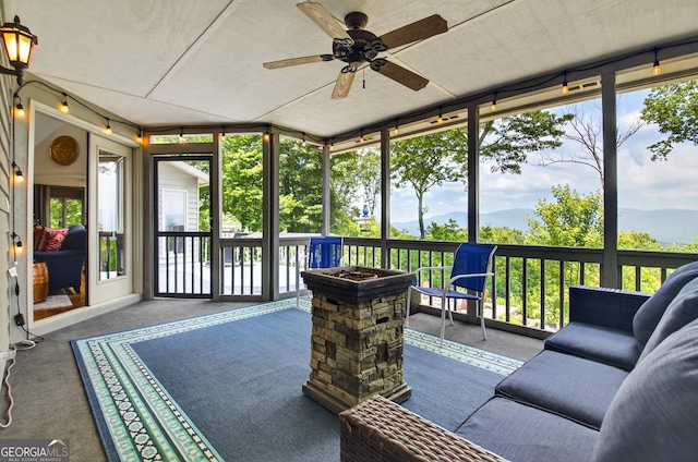 312 Mollie Mountain Trl, Ellijay, GA 30536 - sunroom / solarium with a ceiling fan, an outdoor living space, and healthy amount of natural light