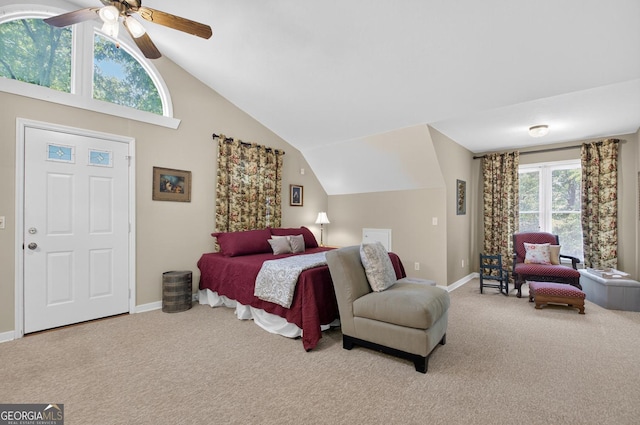 312 Mollie Mountain Trl, Ellijay, GA 30536 - kitchen with white microwave, vaulted ceiling, light carpet, white cabinetry, and dark countertops