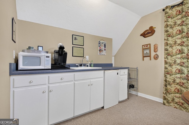 312 Mollie Mountain Trl, Ellijay, GA 30536 - bathroom featuring vanity, lofted ceiling, and tile patterned floors