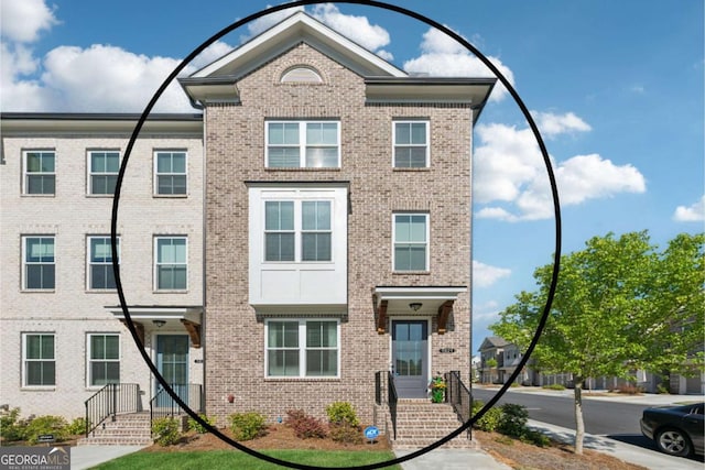 1621 Wellborn Walk, Suwanee, GA 30024 - view of property featuring brick siding