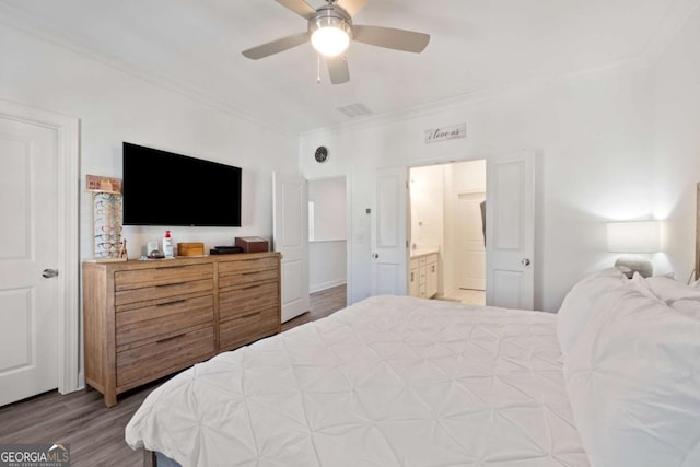 1621 Wellborn Walk, Suwanee, GA 30024 - bedroom featuring ornamental molding, wood finished floors, ensuite bath, and a ceiling fan