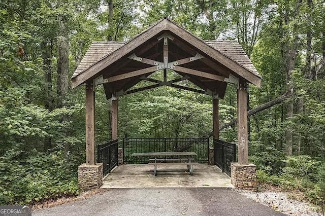 1621 Wellborn Walk, Suwanee, GA 30024 - view of community with a view of trees and a gazebo