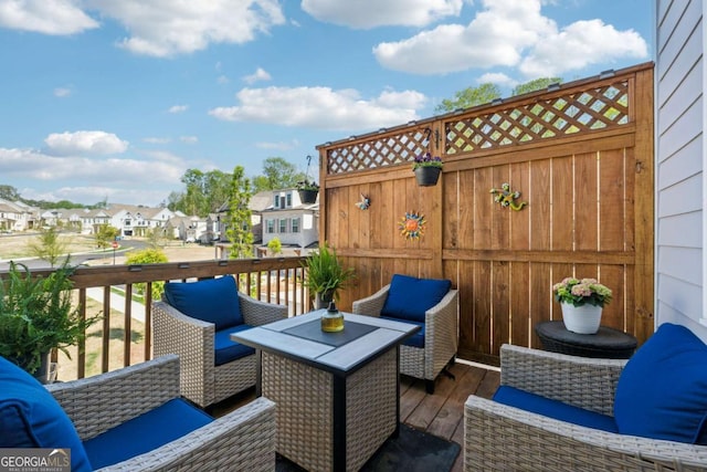 1621 Wellborn Walk, Suwanee, GA 30024 - wooden deck featuring an outdoor hangout area and a residential view