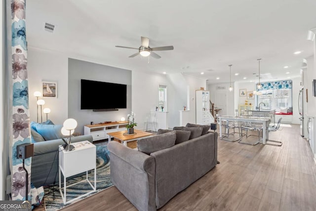 1621 Wellborn Walk, Suwanee, GA 30024 - living room featuring ceiling fan, wood finished floors, and recessed lighting