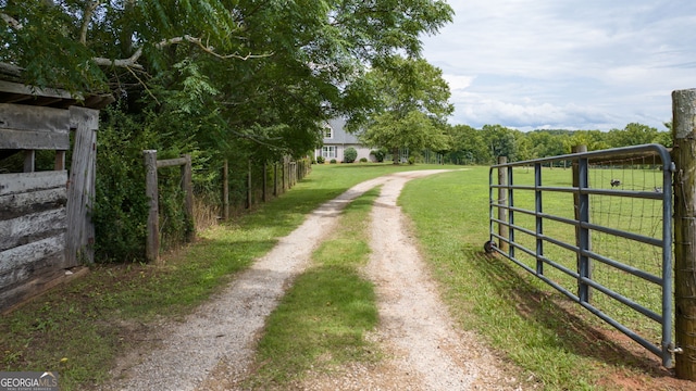 107 Line Creek Rd, Nicholson, GA 30565 - view of dirt / gravel road featuring a gated entry
