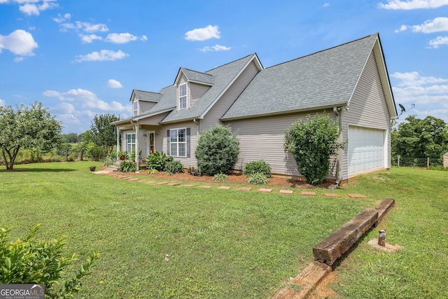 107 Line Creek Rd, Nicholson, GA 30565 - view of property exterior featuring a shingled roof, a yard, and an attached garage