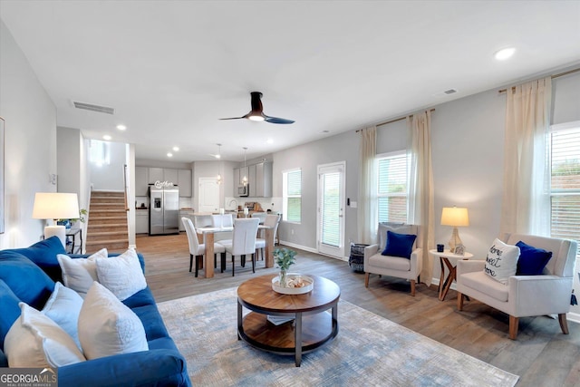 217 Rusty Plow Ln Unit 68, Perry, GA 31069 - living room featuring light wood-style floors, healthy amount of natural light, stairway, and recessed lighting