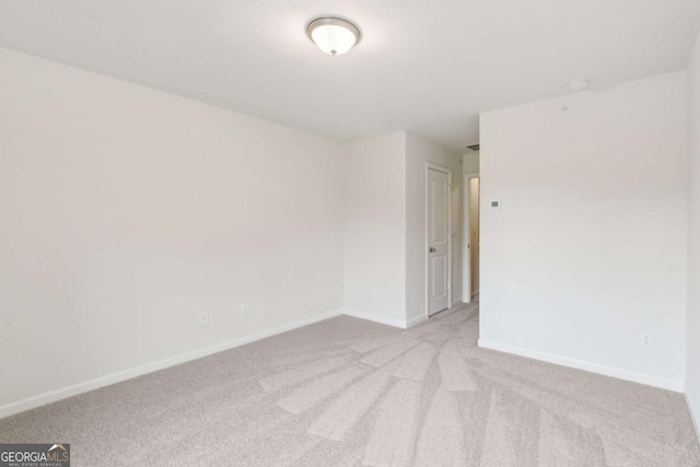 4001 Avalon Rd SW, Atlanta, GA 30331 - empty room featuring carpet floors and baseboards