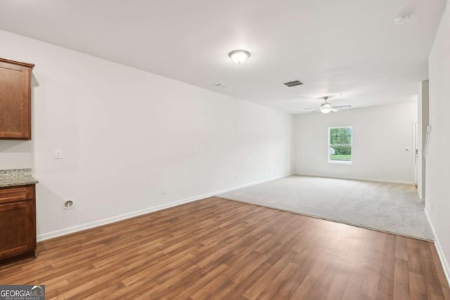 4001 Avalon Rd SW, Atlanta, GA 30331 - empty room with a ceiling fan and light wood-style flooring