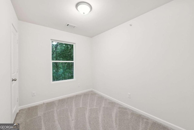 4001 Avalon Rd SW, Atlanta, GA 30331 - carpeted spare room featuring baseboards