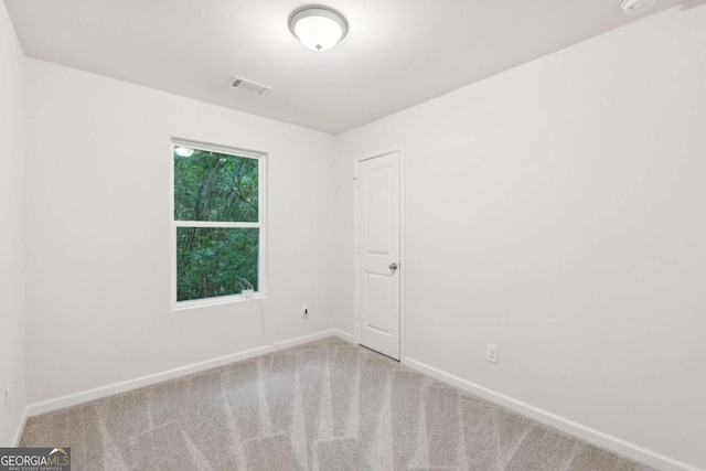 4001 Avalon Rd SW, Atlanta, GA 30331 - carpeted spare room featuring baseboards