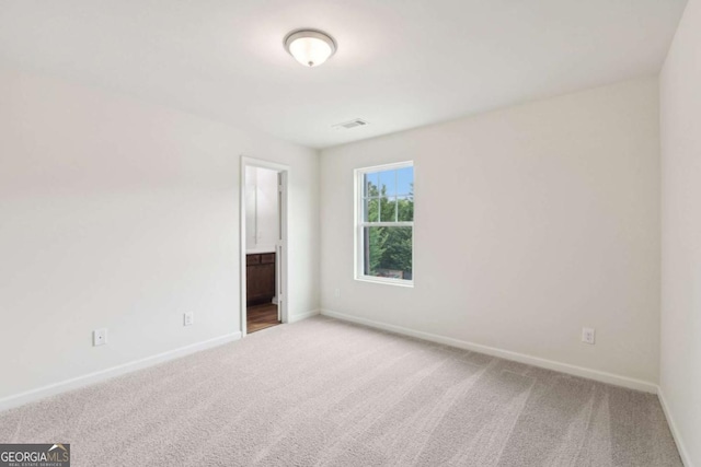 4001 Avalon Rd SW, Atlanta, GA 30331 - carpeted empty room with baseboards