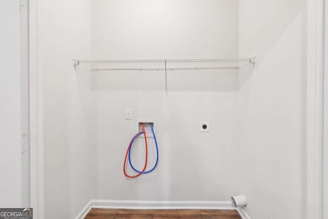 4001 Avalon Rd SW, Atlanta, GA 30331 - laundry area featuring washer hookup, electric dryer hookup, and wood finished floors