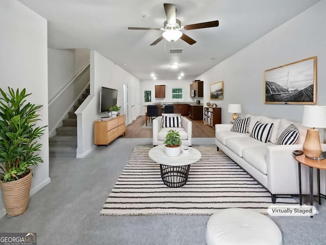 4001 Avalon Rd SW, Atlanta, GA 30331 - living area with ceiling fan and stairway