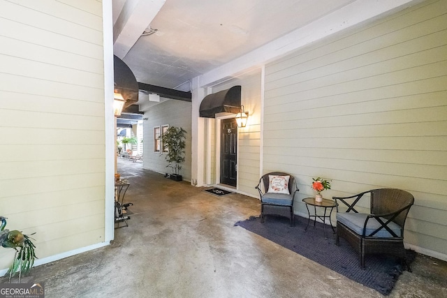 1026 Saint Charles Ave NE Unit 15, Atlanta, GA 30306 - hall featuring wood walls and concrete flooring