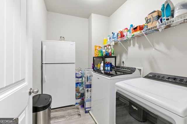 140 Canyons Ct, Hampton, GA 30228 - washroom with washing machine and clothes dryer