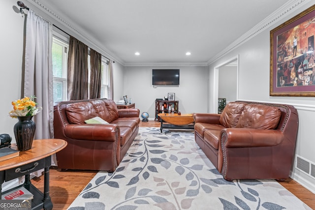 564 Allana Ct, Stone Mountain, GA 30087 - living room with light wood finished floors, crown molding, and recessed lighting