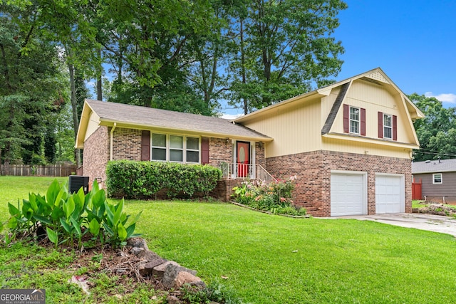 564 Allana Ct, Stone Mountain, GA 30087 - split level home with brick siding, concrete driveway, and an attached garage