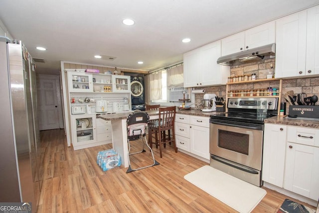 6110 Ga Highway 34, Franklin, GA 30217 - kitchen with appliances with stainless steel finishes, open shelves, under cabinet range hood, white cabinets, and recessed lighting