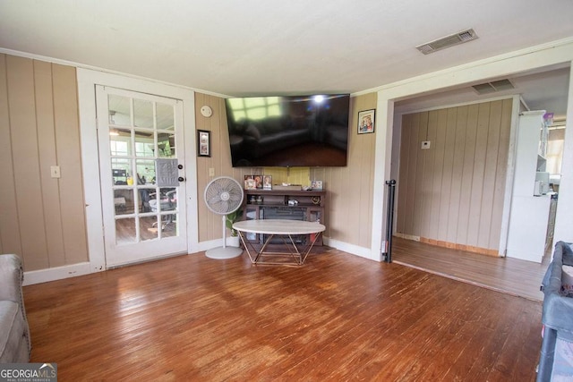6110 Ga Highway 34, Franklin, GA 30217 - living area featuring hardwood / wood-style flooring, crown molding, and wood walls