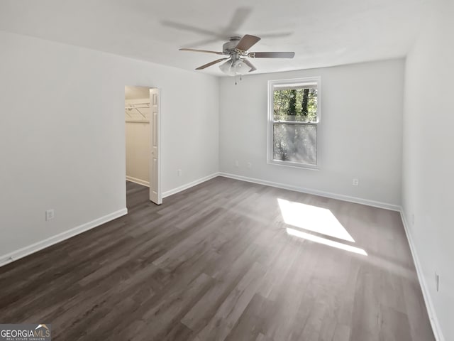 6220 Brookwood Rd, Peachtree Corners, GA 30092 - spare room with a ceiling fan and dark wood-style flooring