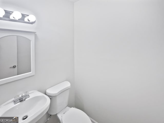 6220 Brookwood Rd, Peachtree Corners, GA 30092 - half bath featuring a sink and toilet