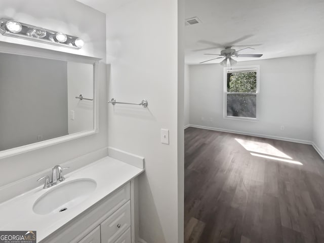 6220 Brookwood Rd, Peachtree Corners, GA 30092 - bathroom featuring ceiling fan, wood finished floors, and vanity