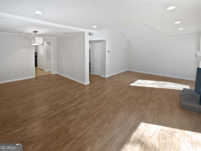 6220 Brookwood Rd, Peachtree Corners, GA 30092 - unfurnished living room featuring wood finished floors, recessed lighting, and crown molding