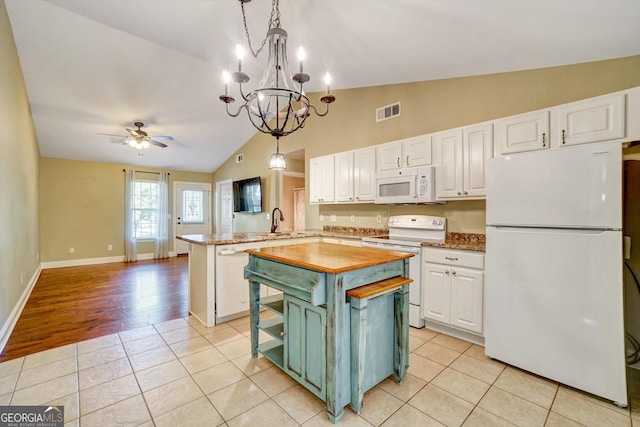 209 Jacobs Way Apt B, Jasper, GA 30143 - kitchen with white appliances, vaulted ceiling, white cabinetry, a peninsula, and ceiling fan
