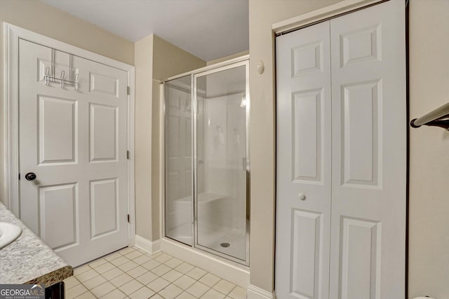 209 Jacobs Way Apt B, Jasper, GA 30143 - bathroom with a shower stall, tile patterned flooring, vanity, and a closet
