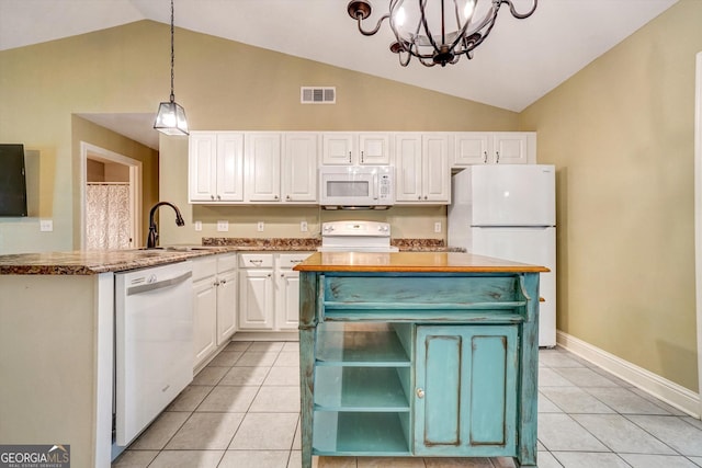 209 Jacobs Way Apt B, Jasper, GA 30143 - kitchen with white appliances, vaulted ceiling, white cabinets, a chandelier, and light tile patterned flooring