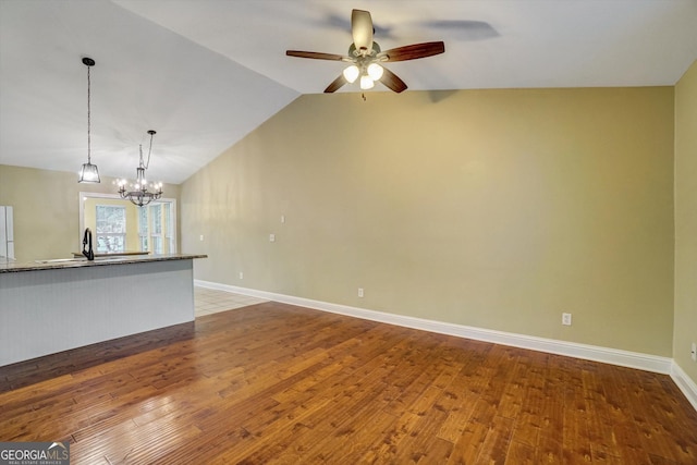 209 Jacobs Way Apt B, Jasper, GA 30143 - unfurnished living room featuring wood finished floors, ceiling fan, a chandelier, and lofted ceiling