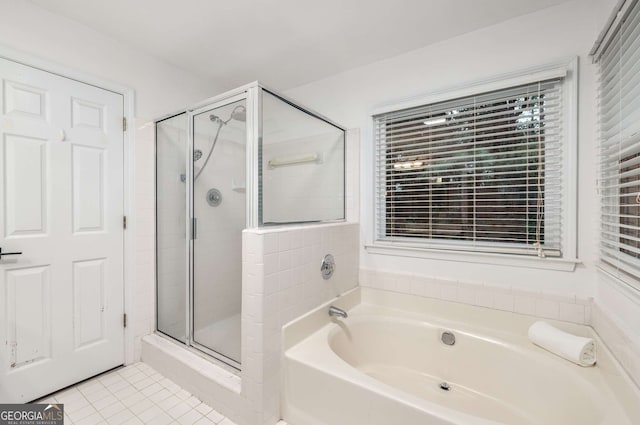 5315 Bentley Hall Dr, Alpharetta, GA 30005 - bathroom featuring a garden tub, a stall shower, and tile patterned flooring