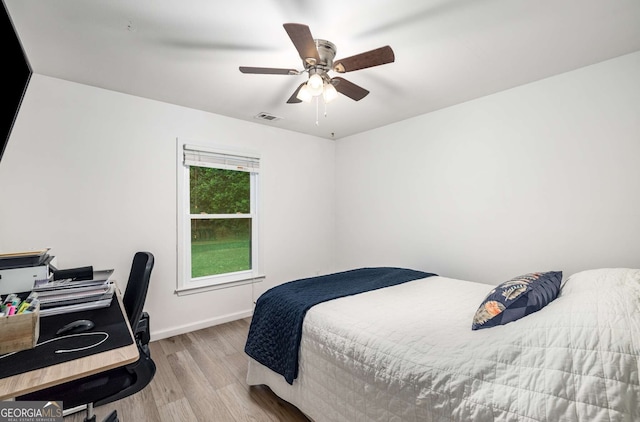 5315 Bentley Hall Dr, Alpharetta, GA 30005 - bedroom with wood finished floors, an office area, and ceiling fan