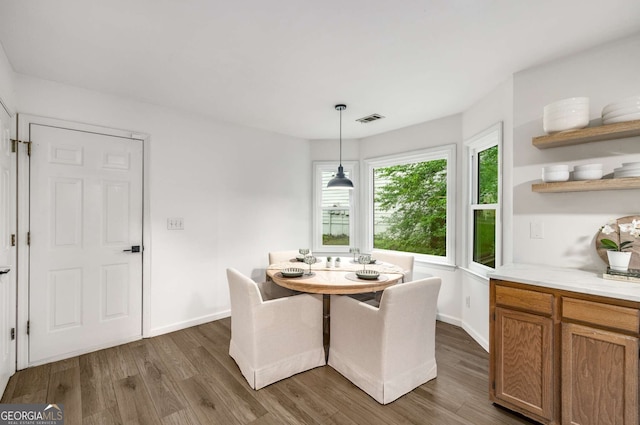 5315 Bentley Hall Dr, Alpharetta, GA 30005 - dining space with dark wood-style floors