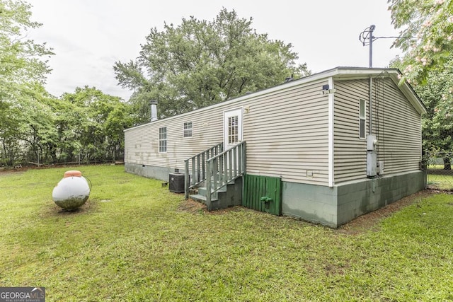 912 Druid St, Dublin, GA 31021 - rear view of property with entry steps and crawl space