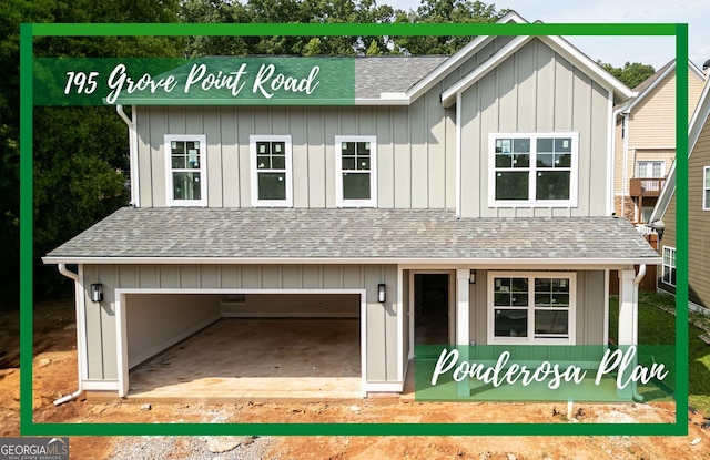 195 Grove Point Rd, Athens, GA 30605 - view of front facade with board and batten siding, a shingled roof, and a garage