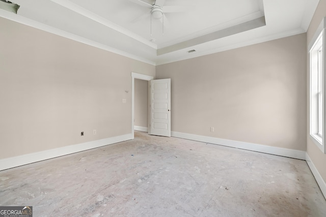 195 Grove Point Rd, Athens, GA 30605 - spare room with healthy amount of natural light, ornamental molding, a tray ceiling, and a ceiling fan