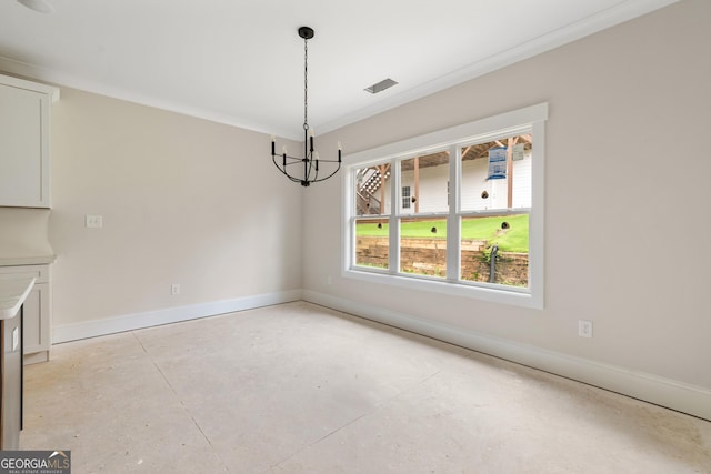 195 Grove Point Rd, Athens, GA 30605 - unfurnished dining area with concrete flooring, a chandelier, and ornamental molding