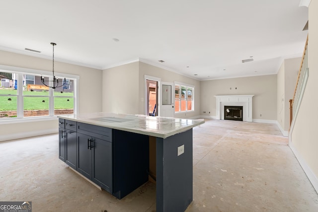 195 Grove Point Rd, Athens, GA 30605 - kitchen featuring dark cabinets, a chandelier, a center island, ornamental molding, and decorative light fixtures
