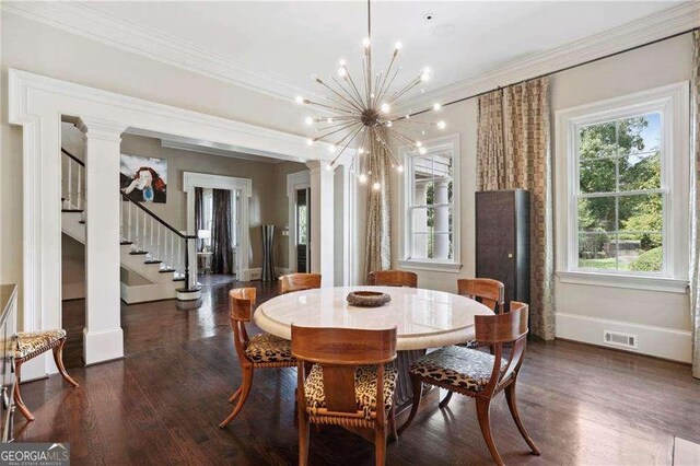 2883 Andrews Dr NW, Atlanta, GA 30305 - dining room featuring crown molding, stairs, a chandelier, and dark wood-style floors