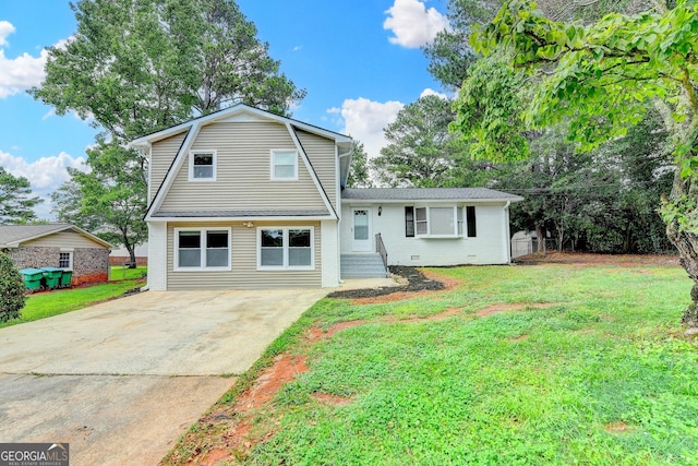 1094 SW Amber Rdg SW, Lilburn, GA 30047 - view of front of home featuring driveway, a front lawn, and a gambrel roof