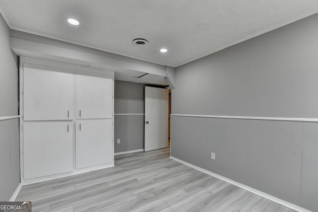 1094 SW Amber Rdg SW, Lilburn, GA 30047 - unfurnished bedroom with light wood-type flooring and recessed lighting