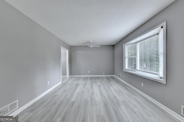 1094 SW Amber Rdg SW, Lilburn, GA 30047 - spare room with ceiling fan and light wood-style floors